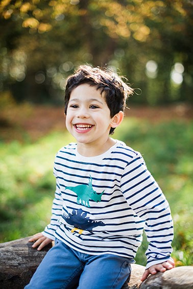 Boy smiling during photo shoot Epsom